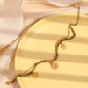 Boho kleurrijke armband - groene tinten - goud tinten hangers - dubbele armbandje - roestvrij staal - Afbeelding 3