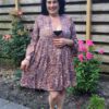 Boho vintage jurk met 7/8 uitlopende mouwen, knoppen en volant maat 38